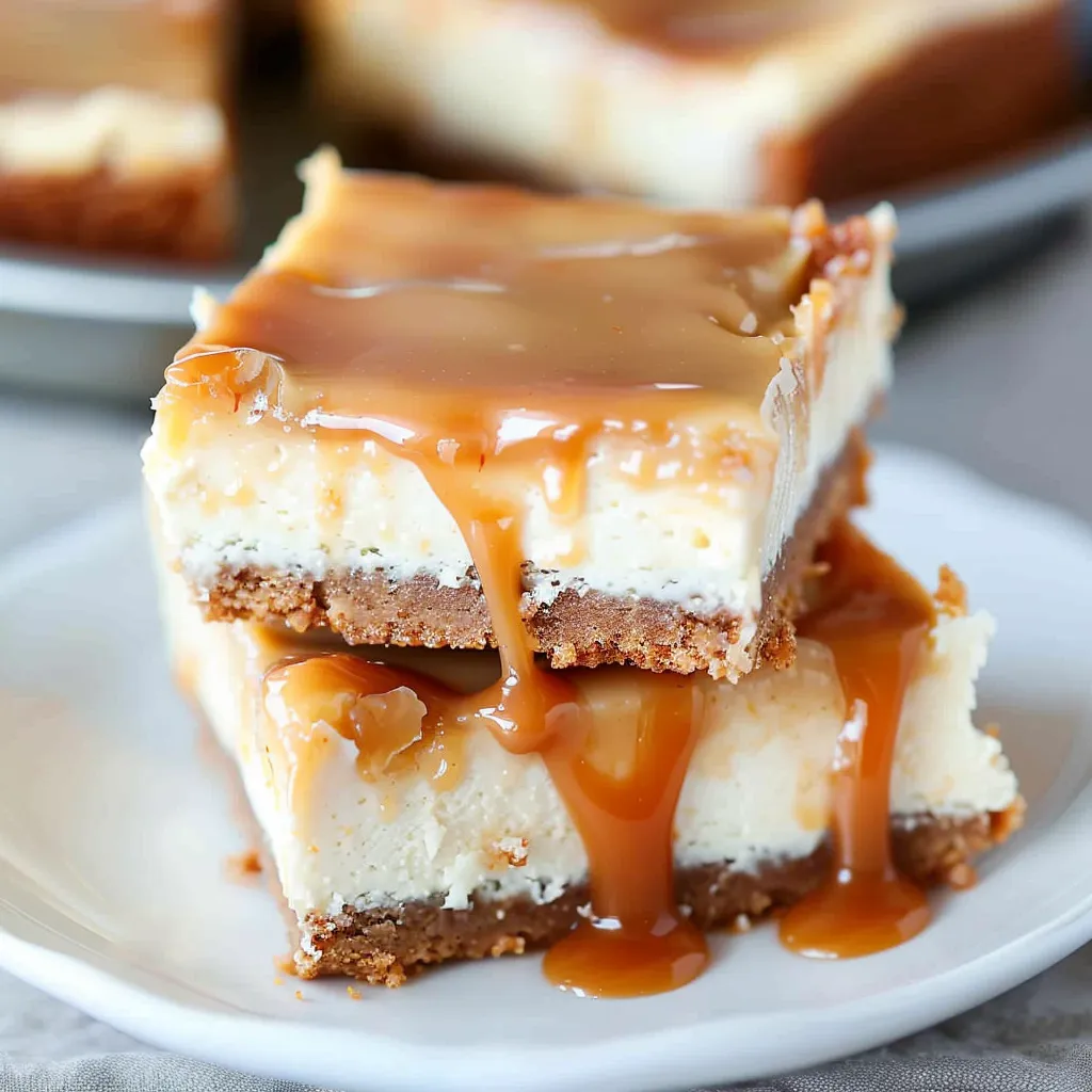 A slice of cheesecake with caramel sauce drizzled on top.